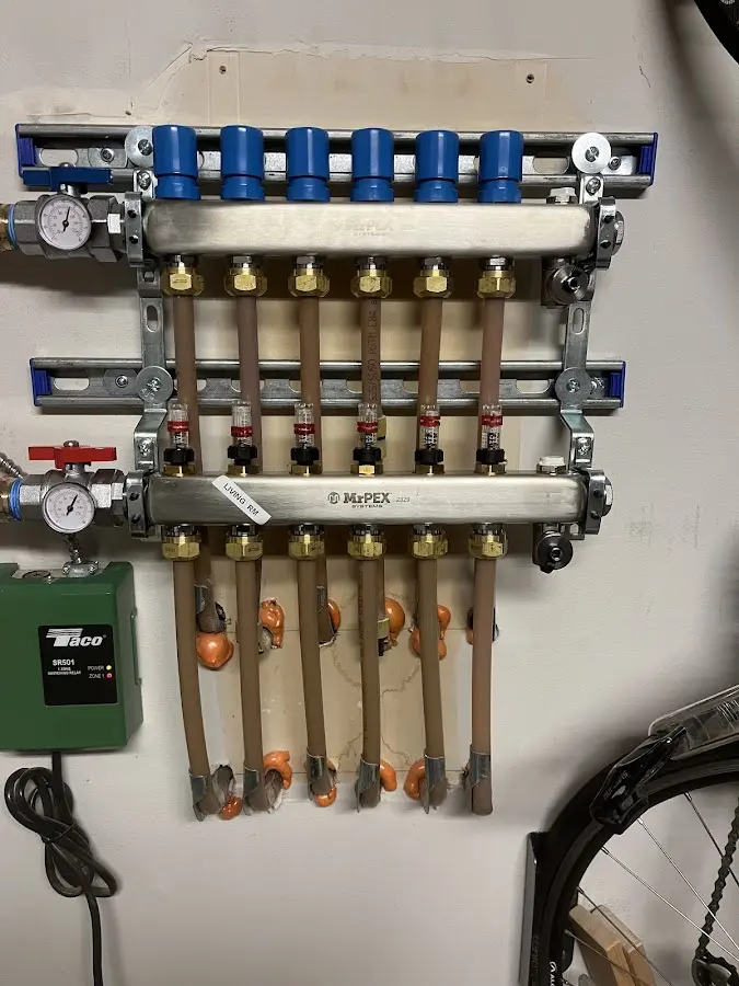 Plumber performing Gas Line Installation at a residential property in Charlestown